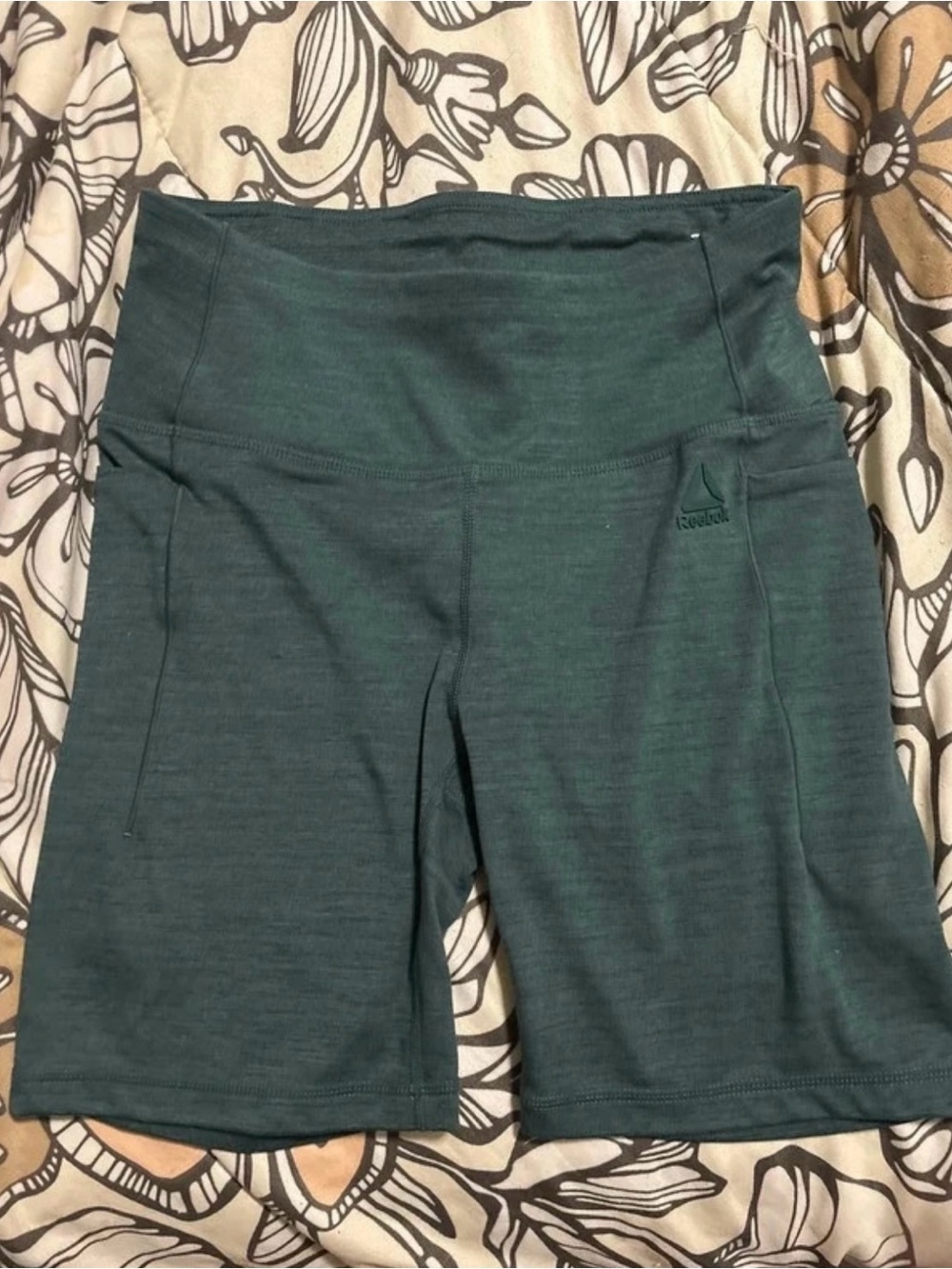 Reebok Women’s High-Rise Bike Shorts in Teal Green